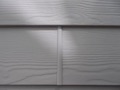 What are the vertical butt joint requirements for fiber-cement (Hardiplank) lap siding?